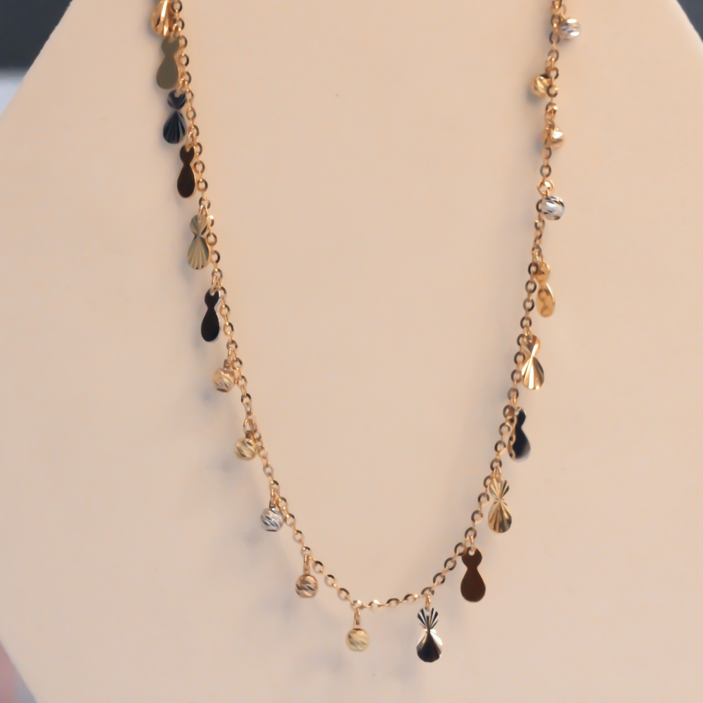 Dangling Potlis Gold Necklace